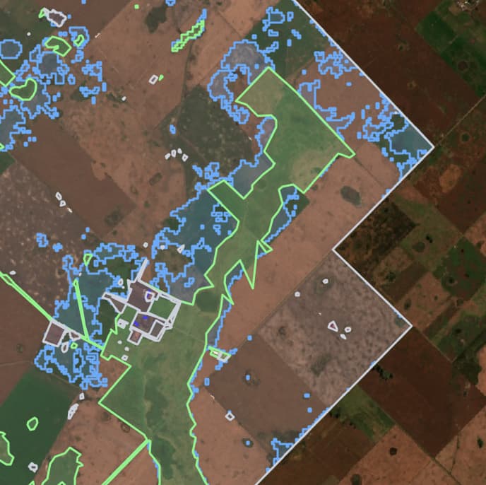 ML-processed imagery showing detected deforestation and field boundaries highlighted